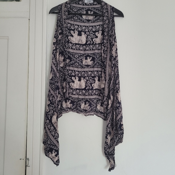 Sleeveless open front vest - Picture 2 of 4